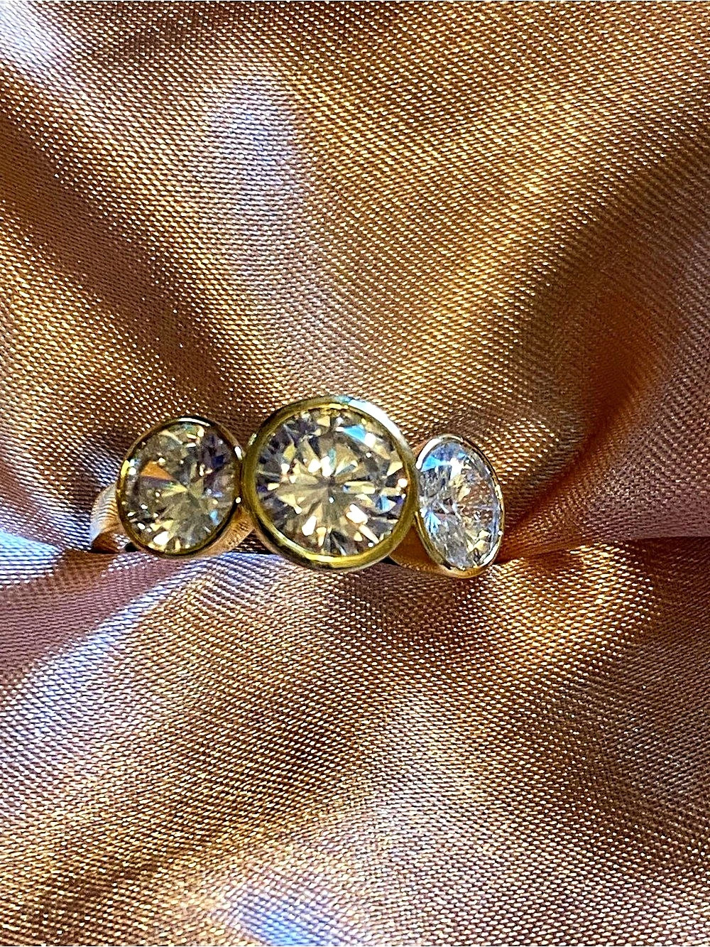 Three-Stone Ring Bezel Set CZ in Gold over .925 silver NWOT. Size 9